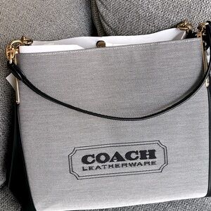 Coach-beautiful salt- Black satchel hand bag- brand new with coach storage bag
